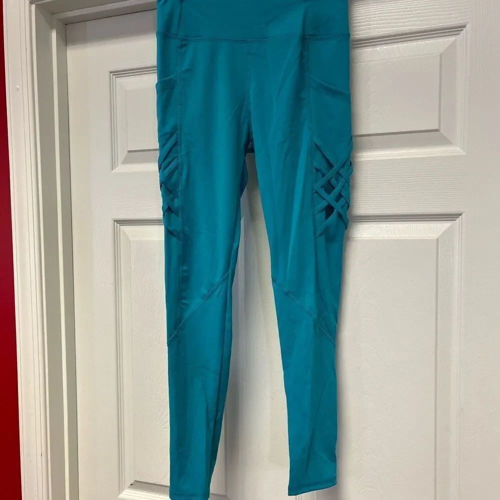 LYDAA Turquoise Criss Criss Leggings S/M NWT